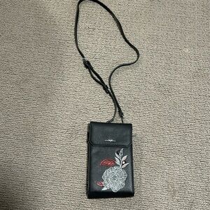 Elegant Black Crossbody Bag with Floral Design